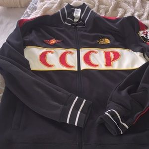 Men’s north face zip up track jacket.